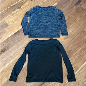 Lululemon tops. EUC. Not sure of size but either a 6 or 8. Tags are removed.